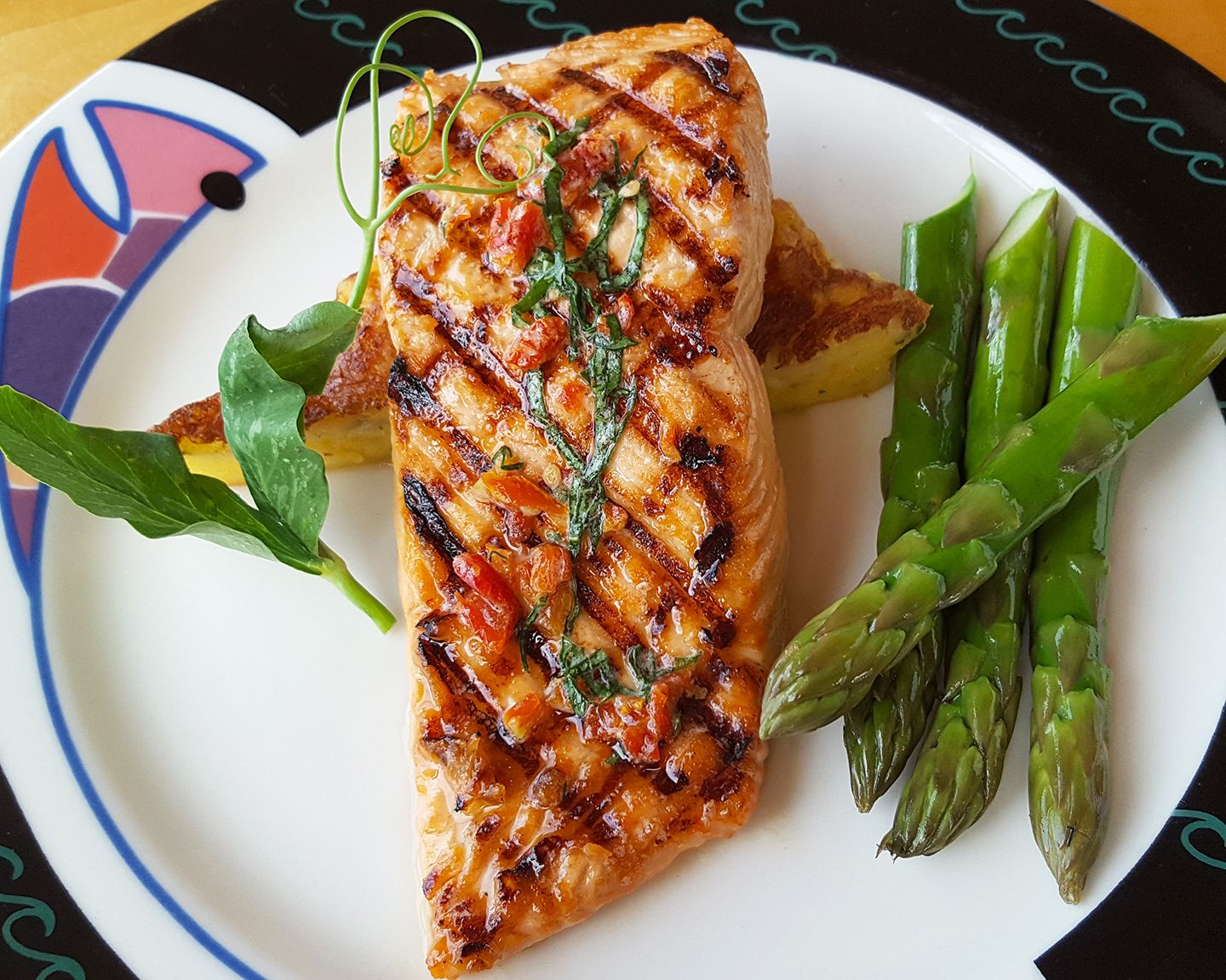 Anthony's at Spokane Falls signature dishes Alder Plank Salmon, Dungeness Crab Cakes, Fresh Oysters on the Half Shell, Anthony's Cobb Salad